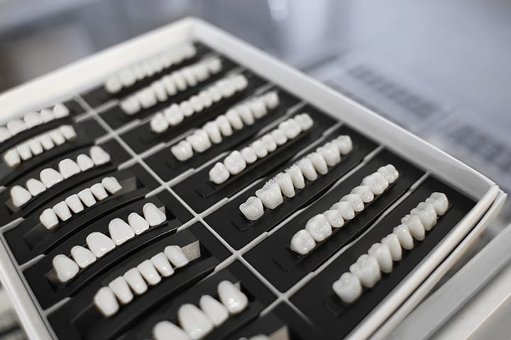 Artificial teeth set used in cosmetic dentistry treatments such as crowns and veneers