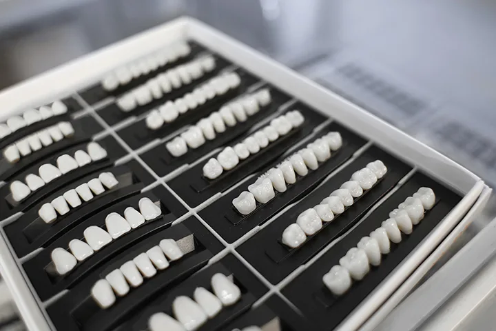 Artificial teeth set used in cosmetic dentistry treatments such as crowns and veneers